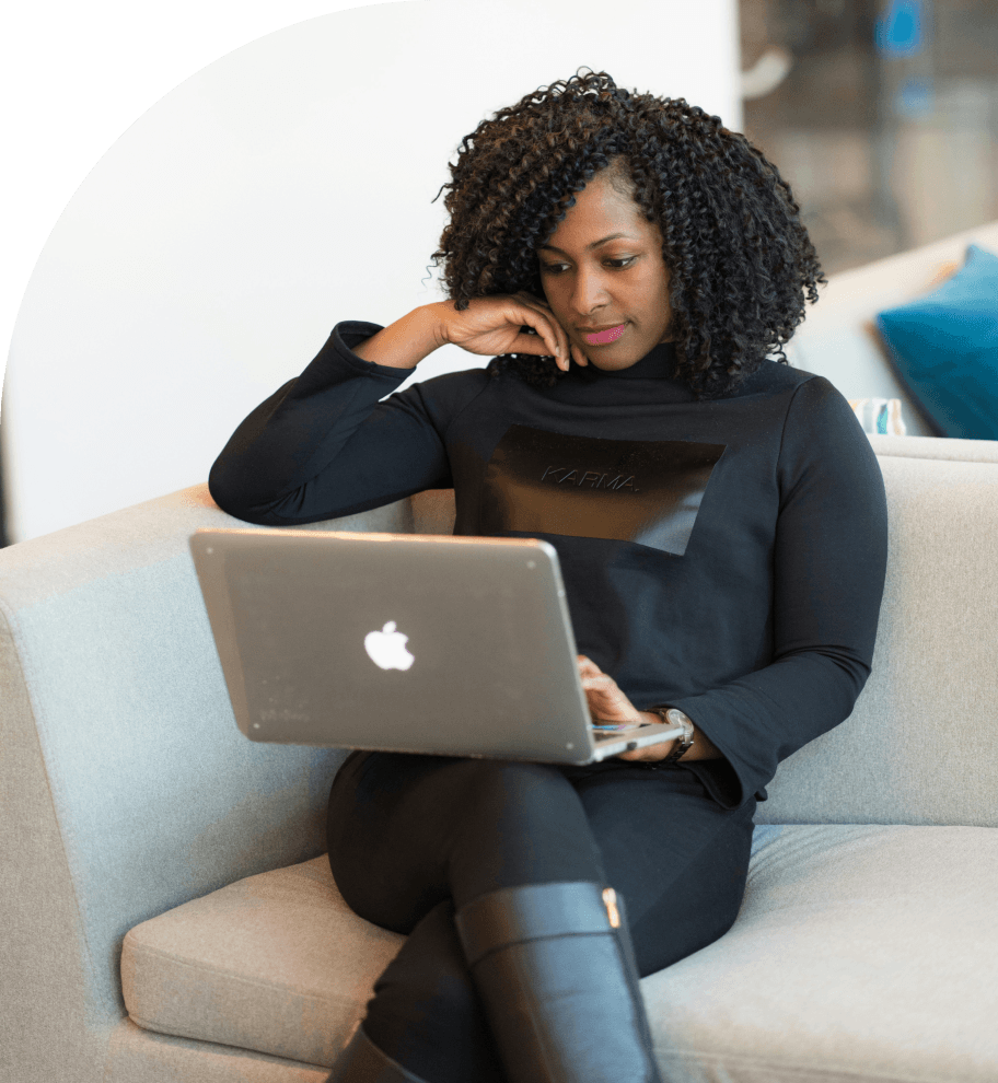 Woman Working on MacBook